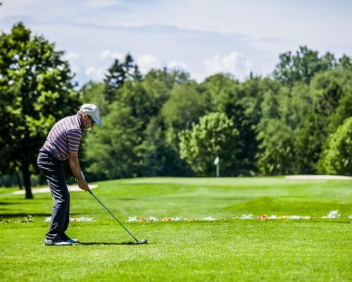 Mature Golfer on a Golf Course (ready to start)